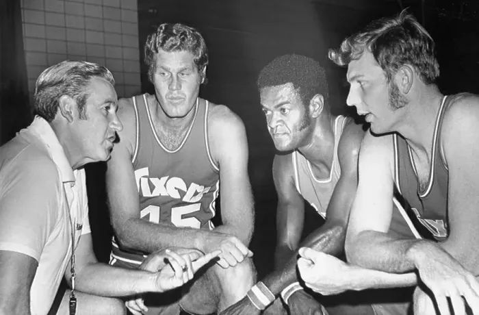 Framed Print : Basketball Coach Talking to Three Players Framed Print : Basketball Coach Talking to Three Players