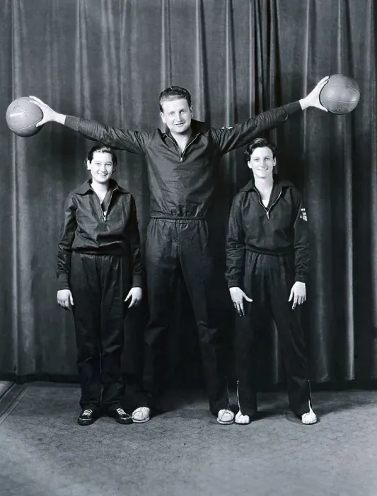 Framed Print : Basketball Player Towers over Babe Didrikson Framed Print : Basketball Player Towers over Babe Didrikson