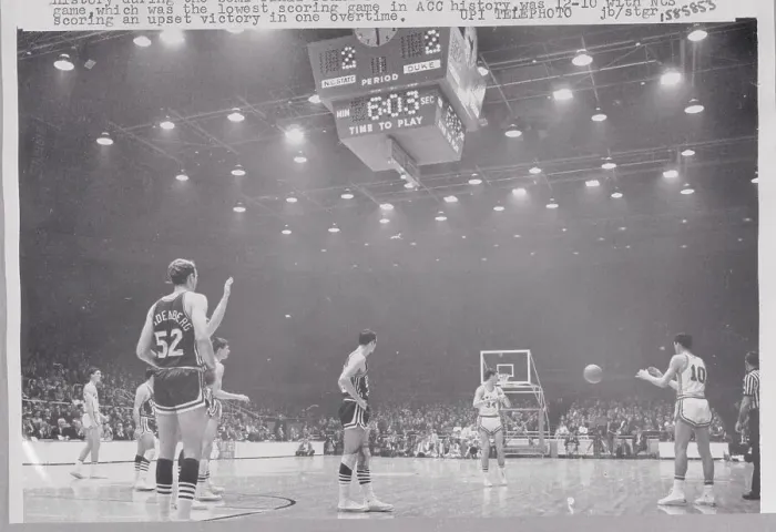 Framed Print : Basketball Players Competing in Game