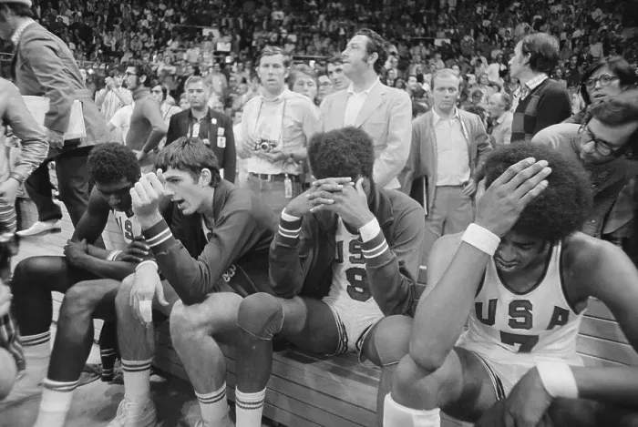 Framed Print : Basketball Players Covering Their Faces in Disappointment Framed Print : Basketball Players Covering Their Faces in Disappointment
