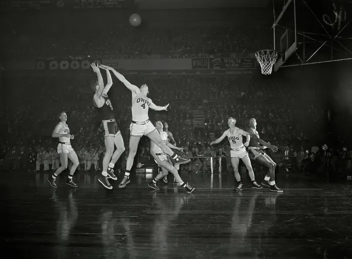 Framed Print : Basketball Players Jumping for Ball Framed Print : Basketball Players Jumping for Ball