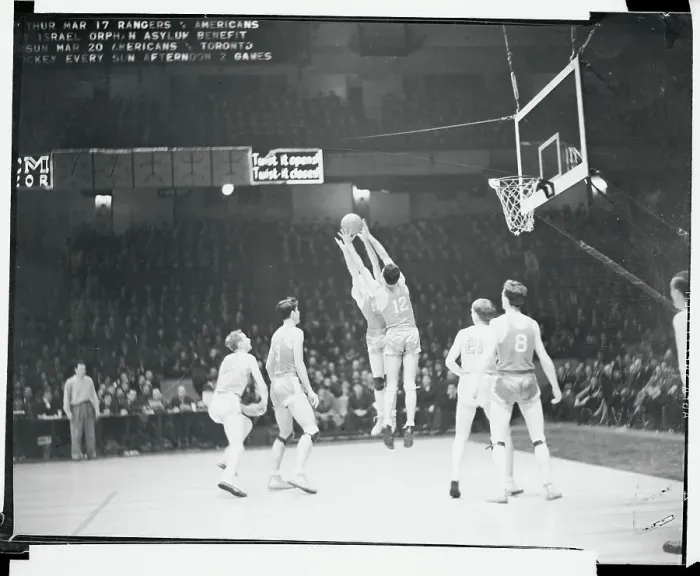 Framed Print : Basketball Players Jumping for Ball Framed Print : Basketball Players Jumping for Ball