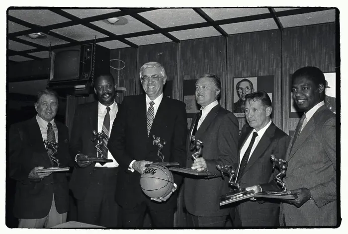 Framed Print : Basketball Players With Trophies Framed Print : Basketball Players With Trophies