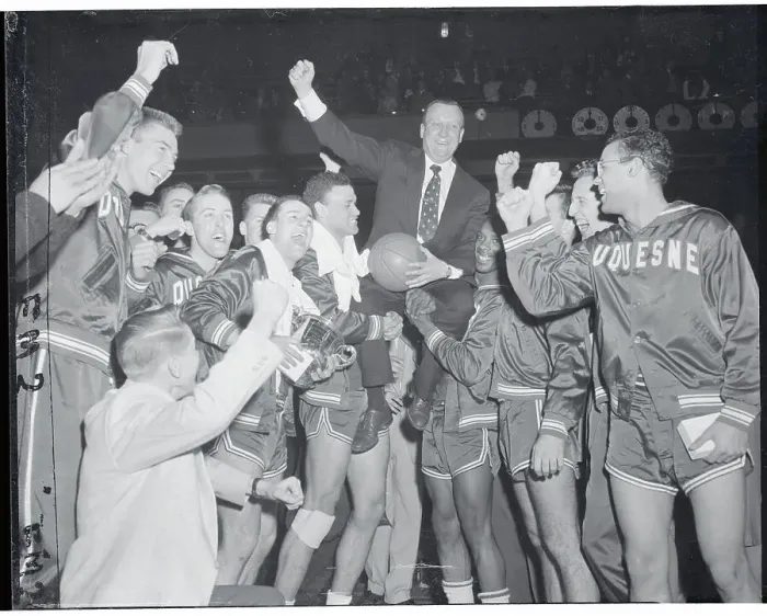 Framed Print : Basketball Teammates Carrying Their Coach