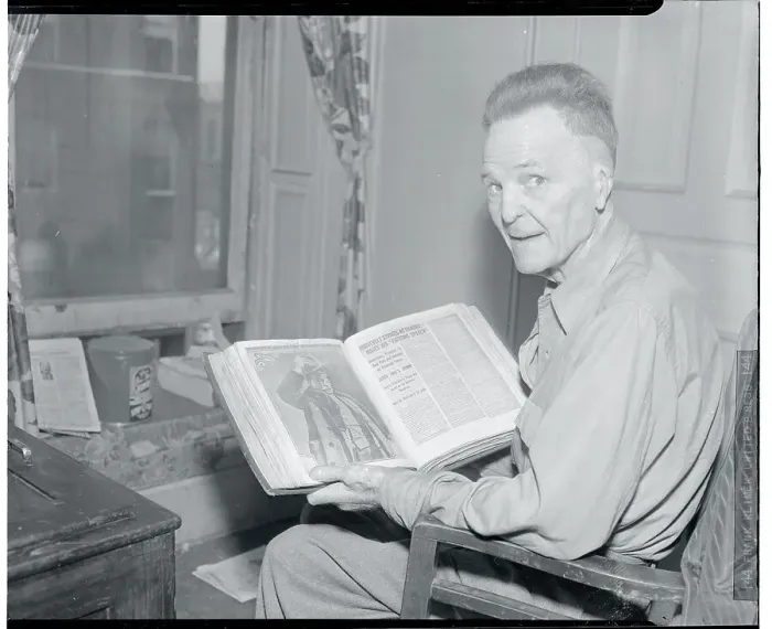 Framed Print : Battling Nelson Looking Through Book Framed Print : Battling Nelson Looking Through Book