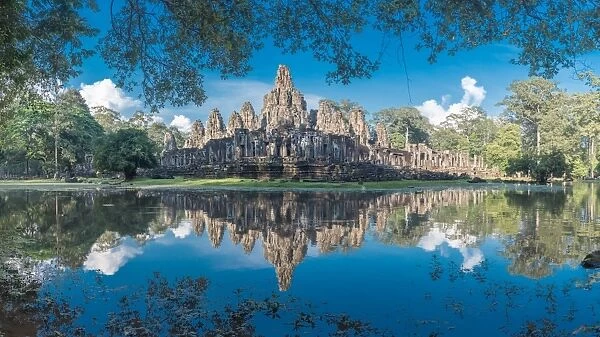 Bayon Temple reflection. Bayon Temple was built as the official state temple of the Mahayana Buddhist King Jayavarman VII