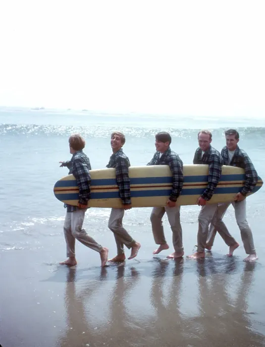 Framed Print : Beach Boys On The Beach With A Surfboard Framed Print : Beach Boys On The Beach With A Surfboard