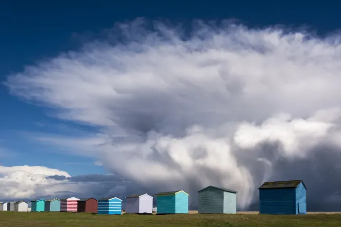 Framed Print : Beach huts and Storm katie Framed Print : Beach huts and Storm katie