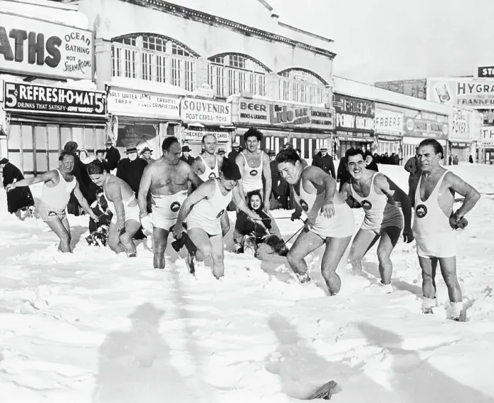 Framed Print : Beach Revelers in Snow Pulling Sled Framed Print : Beach Revelers in Snow Pulling Sled