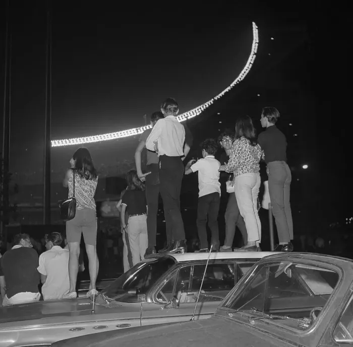 Framed Print : Beatles Fans Standing on Cars Framed Print : Beatles Fans Standing on Cars