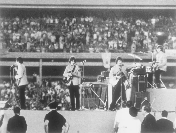 Framed Print : The Beatles Performing in Concert