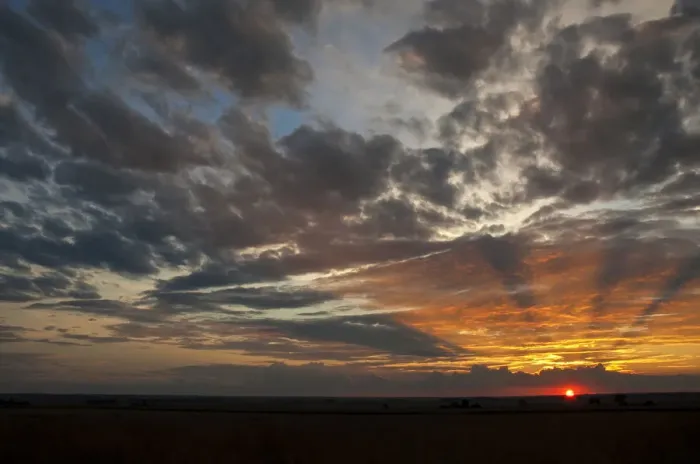 Framed Print : A Beautiful African sunset with sun rays over the agricultural farm lands of the North West Province in South Africa
