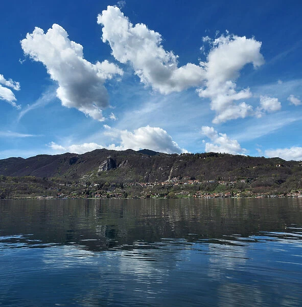 Beautiful Clouds And Blue Sky On Lake Orta In Northern Italy