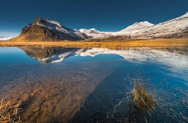 Beautiful scene of Snow mountain with reflection