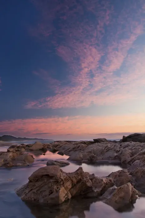 Framed Print : Beautiful soft colour sunrise over the sea with rocks in the foreground - Cape Vidal South Africa Framed Print : Beautiful soft colour sunrise over the sea with rocks in the foreground - Cape Vidal South Africa