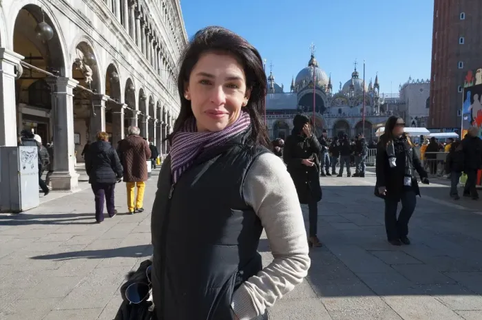 Framed Print : Beautiful woman in St. Marks Square Venice Italy