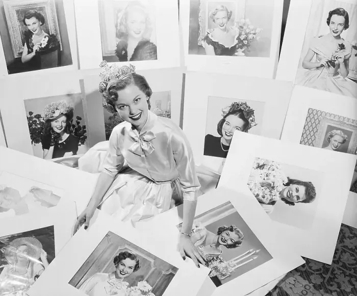 Framed Print : Beauty Contestant Surrounded by Photographs Framed Print : Beauty Contestant Surrounded by Photographs