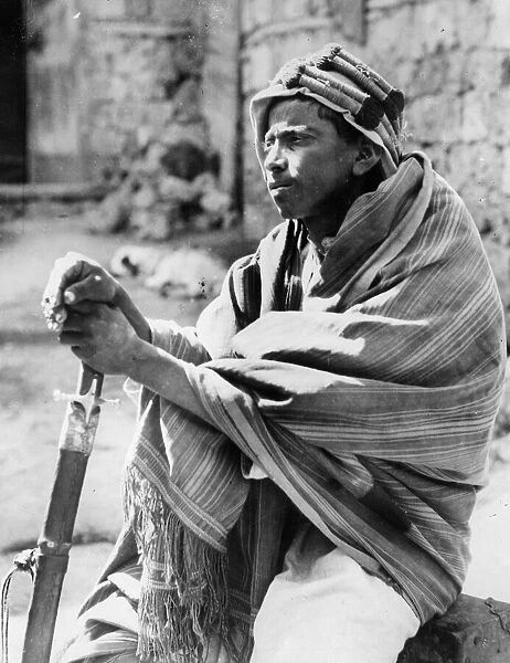 Bedouin. circa 1930: A young bedouin spy in Jiddah 