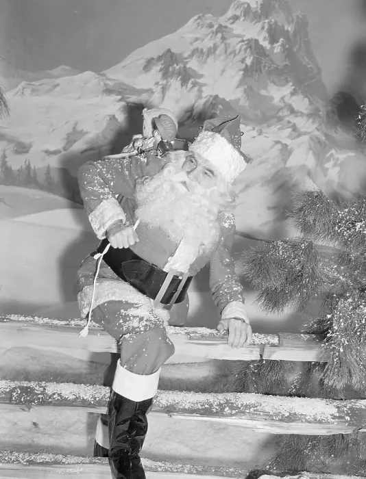 Framed Print : Bela Lugosi as Santa Climbing Over Fence Framed Print : Bela Lugosi as Santa Climbing Over Fence