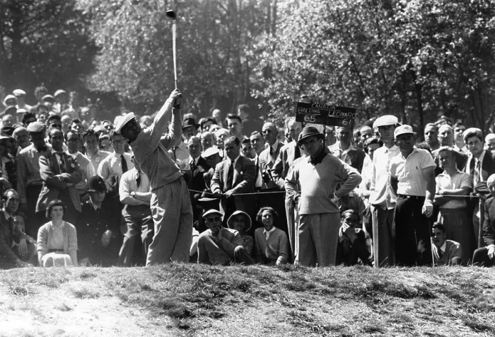 Framed Print : Ben Hogan. American golfer Ben Hogan plays a tee shot as the gallery looks Framed Print : Ben Hogan. American golfer Ben Hogan plays a tee shot as the gallery looks