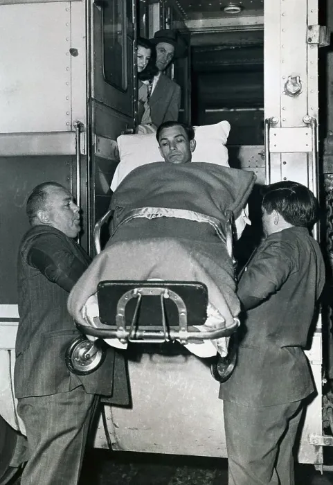Framed Print : Ben Hogan Being Lifted on a Gurney