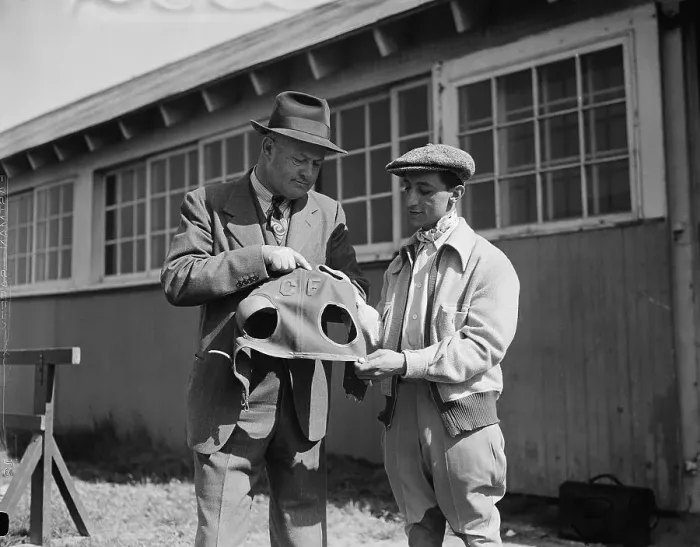 Framed Print : Ben Jones and Eddie Arcaro Examining Blinkers Framed Print : Ben Jones and Eddie Arcaro Examining Blinkers