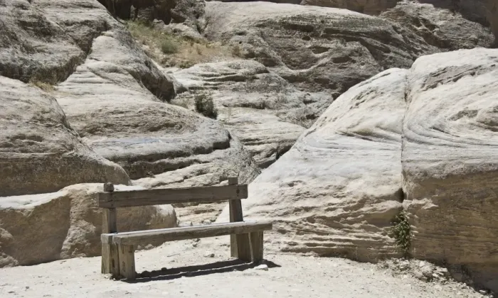 Framed Print : The Bench. An old decaying wooden bench sitting besides the sandstone rock Framed Print : The Bench. An old decaying wooden bench sitting besides the sandstone rock