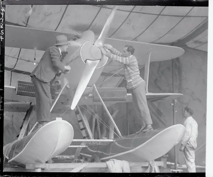 Framed Print : Bert Hinkler Fixing an Airplane Framed Print : Bert Hinkler Fixing an Airplane