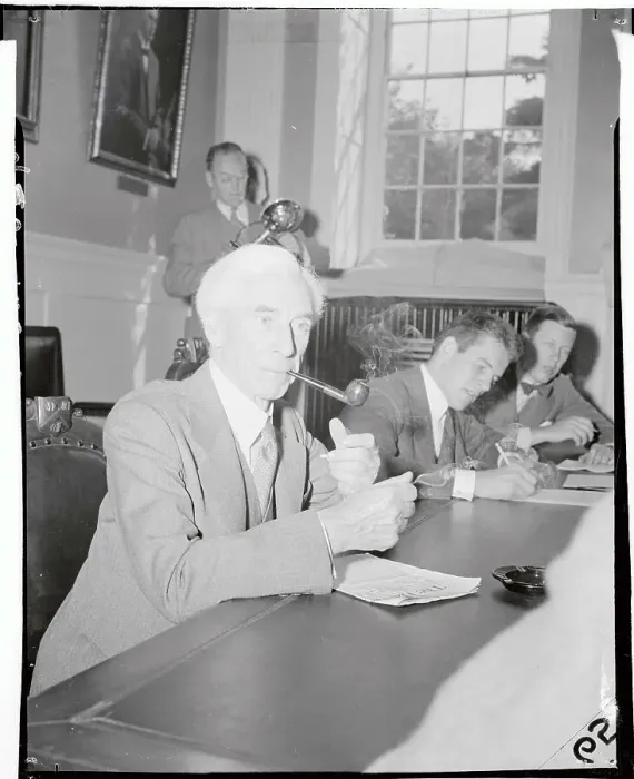 Framed Print : Bertrand Russell Smoking a Pipe at Conference Table