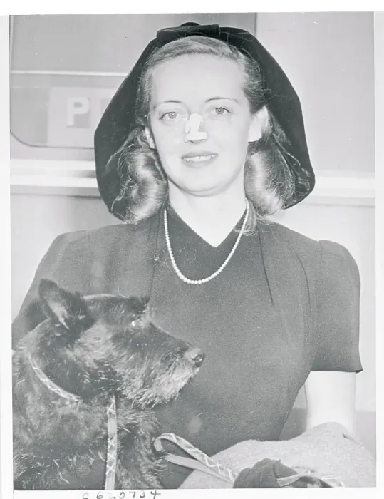 Framed Print : Bette Davis with a Dog Framed Print : Bette Davis with a Dog