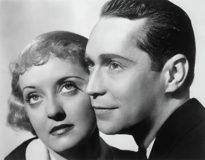 Framed Print : Bette Davis and Franchot Tone in Dangerous