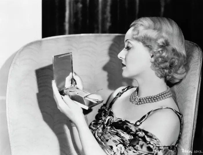 Framed Print : Bette Davis Looking Into Vanity Case Framed Print : Bette Davis Looking Into Vanity Case