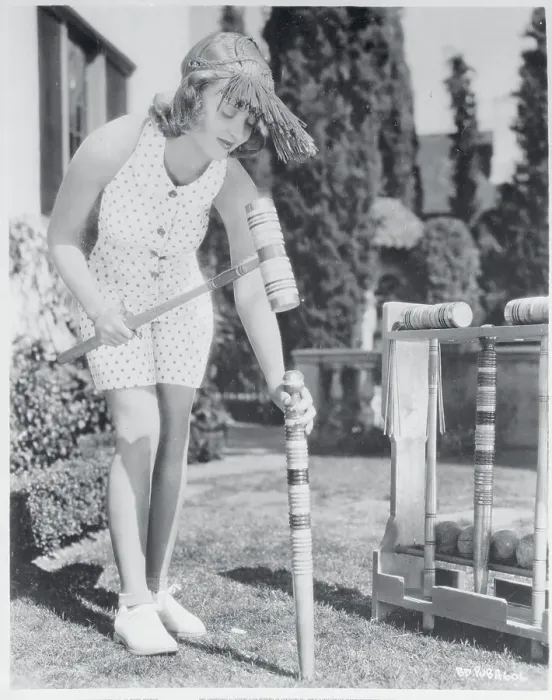 Framed Print : Bette Davis Setting up Croquet Game Framed Print : Bette Davis Setting up Croquet Game