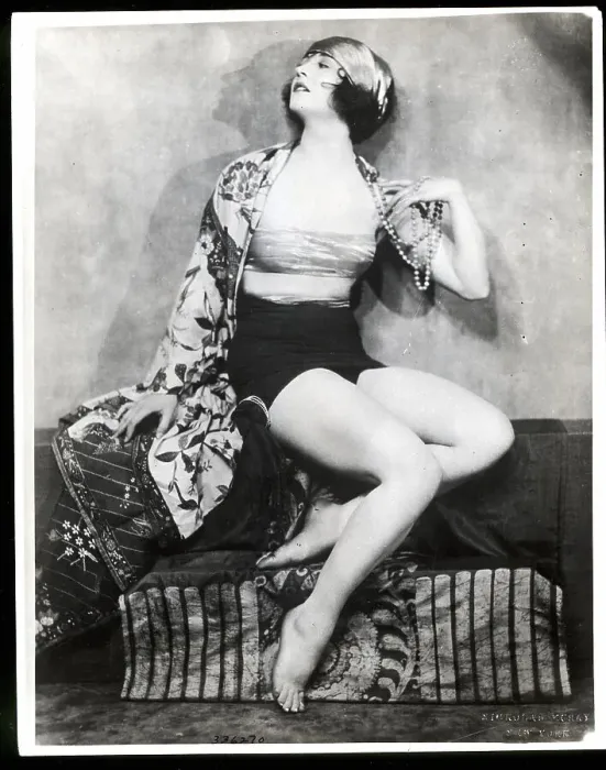 Framed Print : Betty Compson Models Swimwear On Sofa Framed Print : Betty Compson Models Swimwear On Sofa