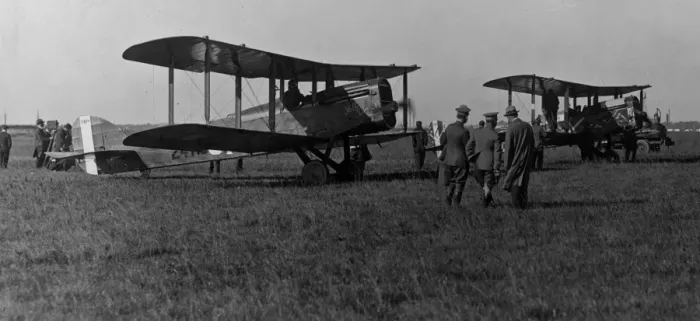 Framed Print : Bi-Planes. circa 1920: Two bi-planes on a airfield getting ready for take-off
