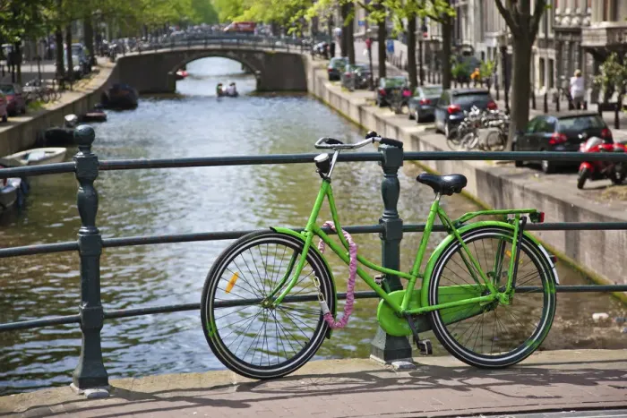 Framed Print : Bicycle on a bridge crossing a canal in the historic city centre of Amsterdam, Holland, Netherlands, Europe Framed Print : Bicycle on a bridge crossing a canal in the historic city centre of Amsterdam, Holland, Netherlands, Europe