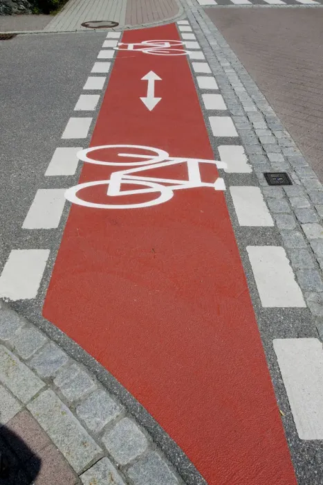Framed Print : Bicycle path marked with red Framed Print : Bicycle path marked with red