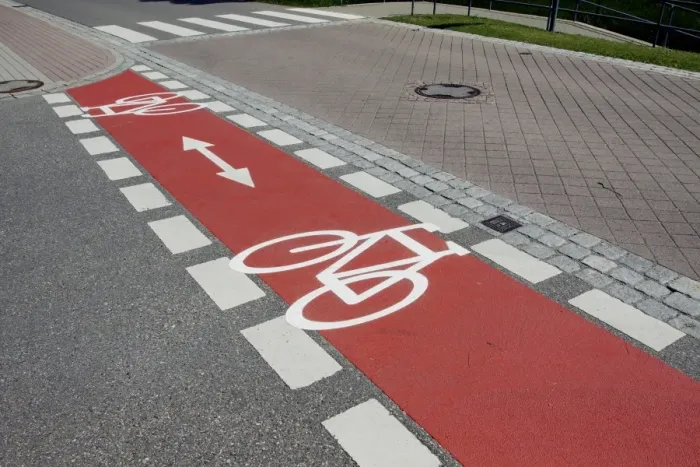 Framed Print : Bicycle path marked with red Framed Print : Bicycle path marked with red