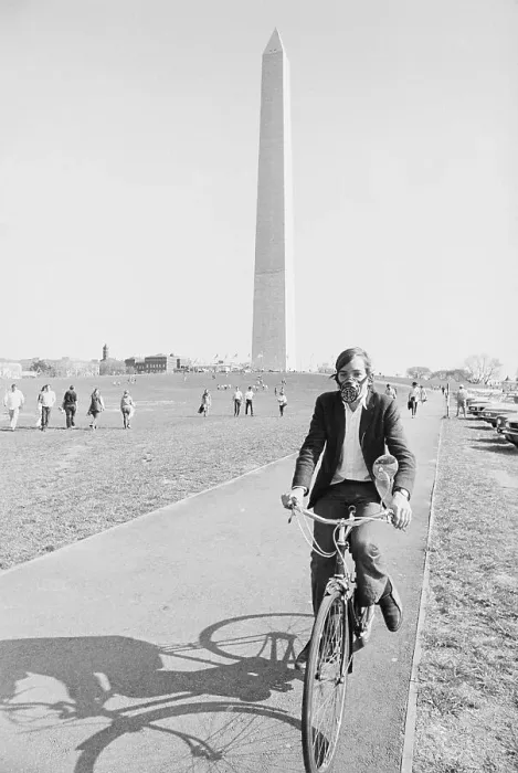Framed Print : Bicyclist Wearing Gas Mask on Earth Day Framed Print : Bicyclist Wearing Gas Mask on Earth Day
