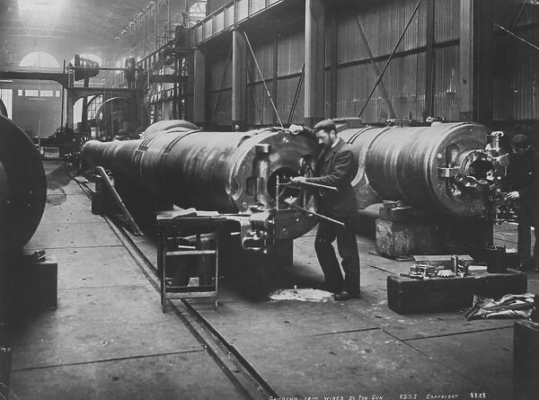 Big Gun. circa 1885: The breech block of a large gun being gauged