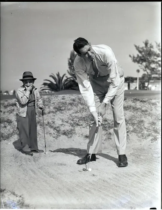 Framed Print : Big And Small Man Play Golf Framed Print : Big And Small Man Play Golf