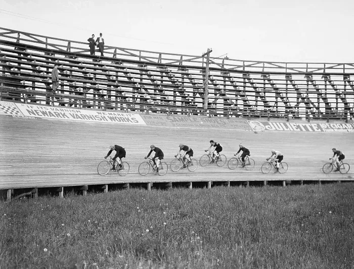 Framed Print : Bikers Race on Track in Newark