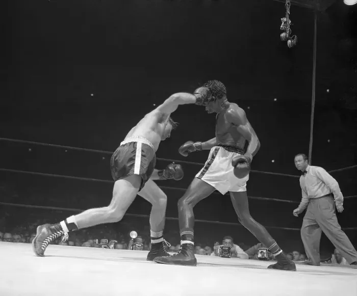 Framed Print : Billy Graham Punching Kid Gavilan