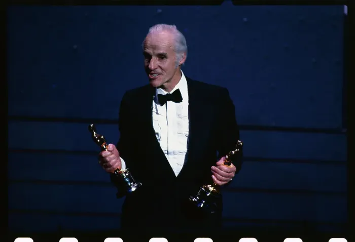 Framed Print : Billy Williams Holding Two Academy Awards Framed Print : Billy Williams Holding Two Academy Awards