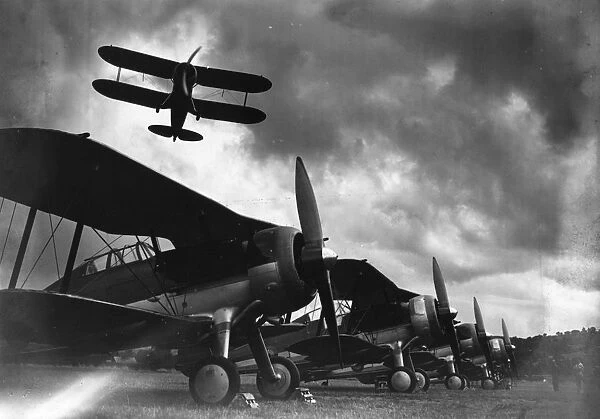 Biplanes. 14th September 1937: Biplanes at Winchmore Hill airfield, in the air