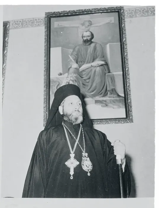 Framed Print : Bishop Photios Standing Beneath Portrait Framed Print : Bishop Photios Standing Beneath Portrait