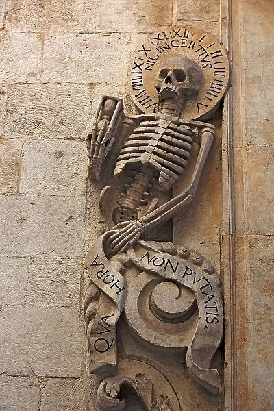 Bitonto, Chiesa del Purgatorio, skeletal sculptures on the portal, Apulia, Italy