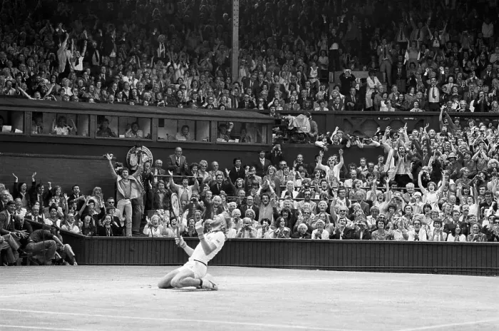 Framed Print : Bjorn Borg Kneeling in Stadium After Win Framed Print : Bjorn Borg Kneeling in Stadium After Win