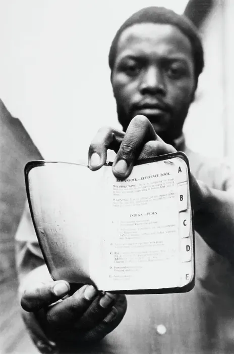 Framed Print : Black African Man Holding Pass-Book Framed Print : Black African Man Holding Pass-Book