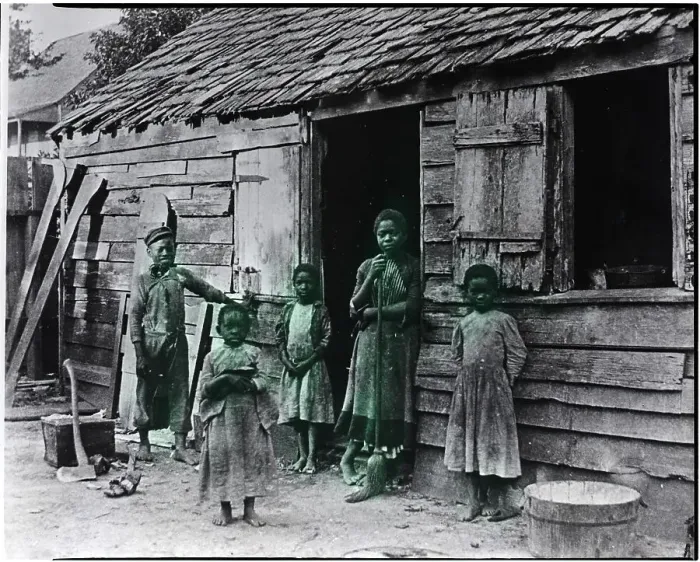 Framed Print : Black Family Standing In Front Of Home